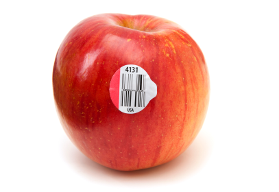 Red apple with a bar code sticker showing traceability.