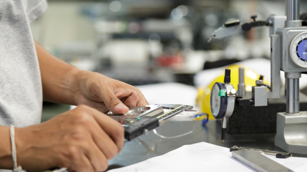 Person holding a tool in an operating demonstrating a quality management program